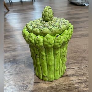 Asparagus decorate ceramic jar.